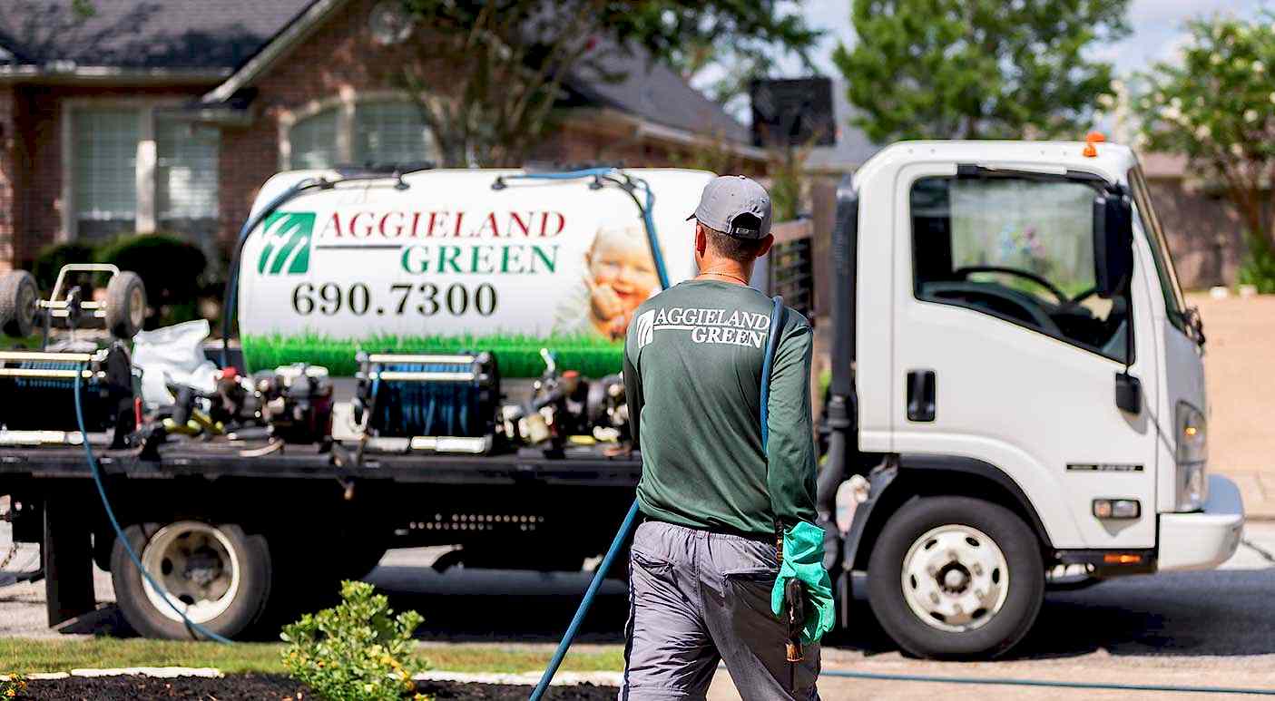 local lawn care company aggieland green treating a texas lawn